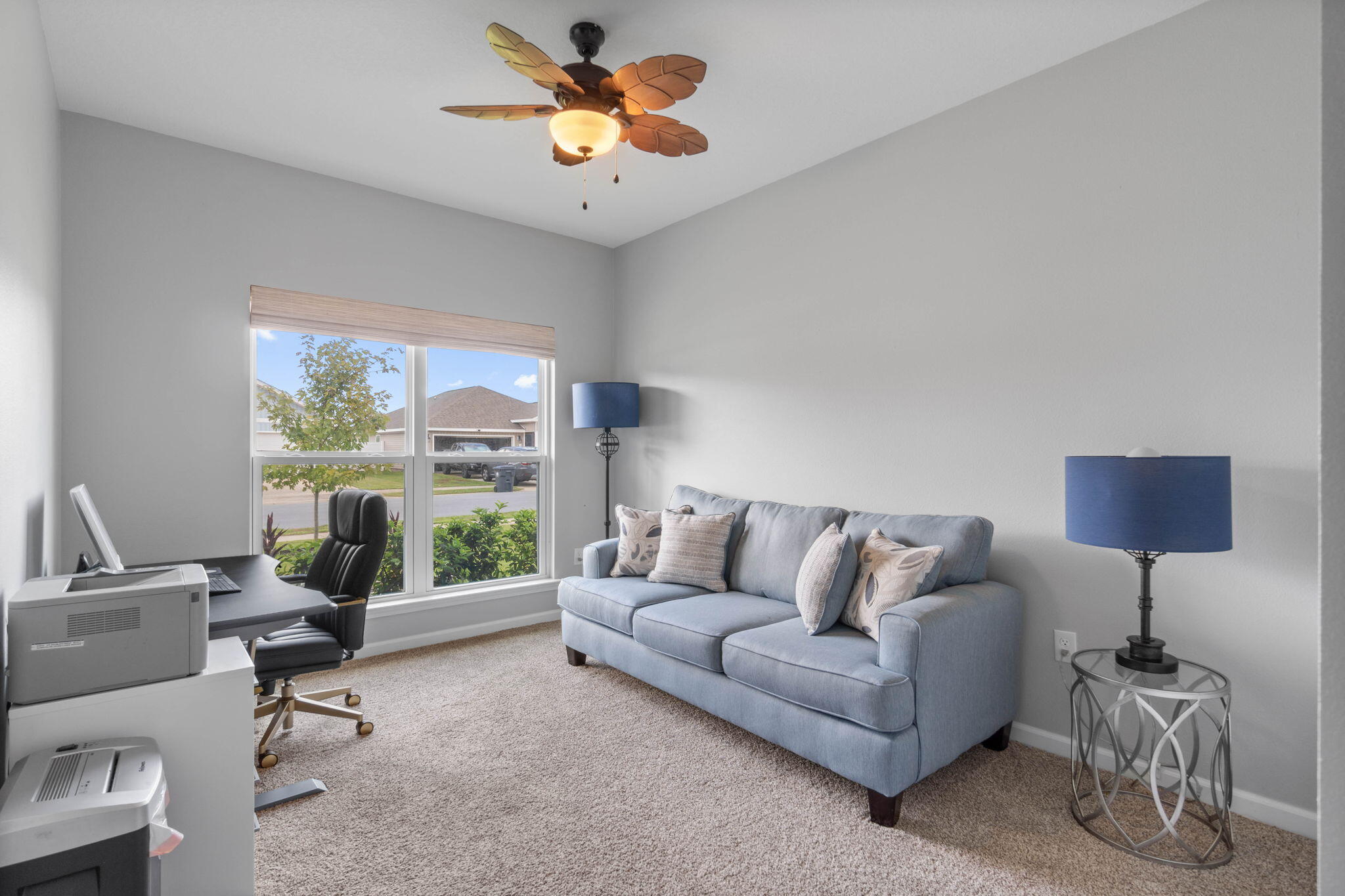 38 Silverthorn Street Freeport, FL 32439 - Photo 29 of 42 a living room with furniture and a large window