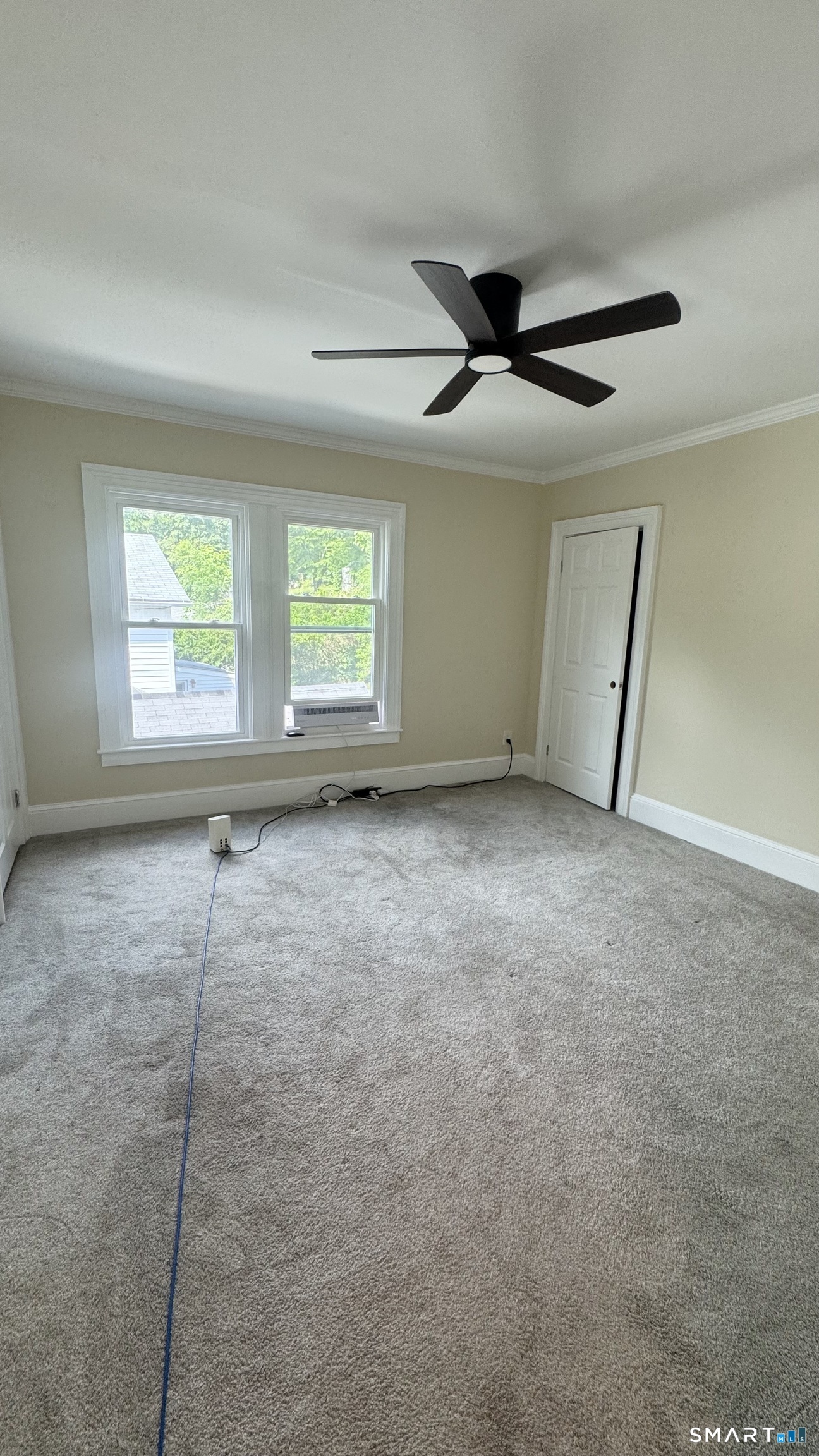 104 Prospect Street Ansonia, CT 06401 - Photo 27 of 40 a view of an empty room with a window