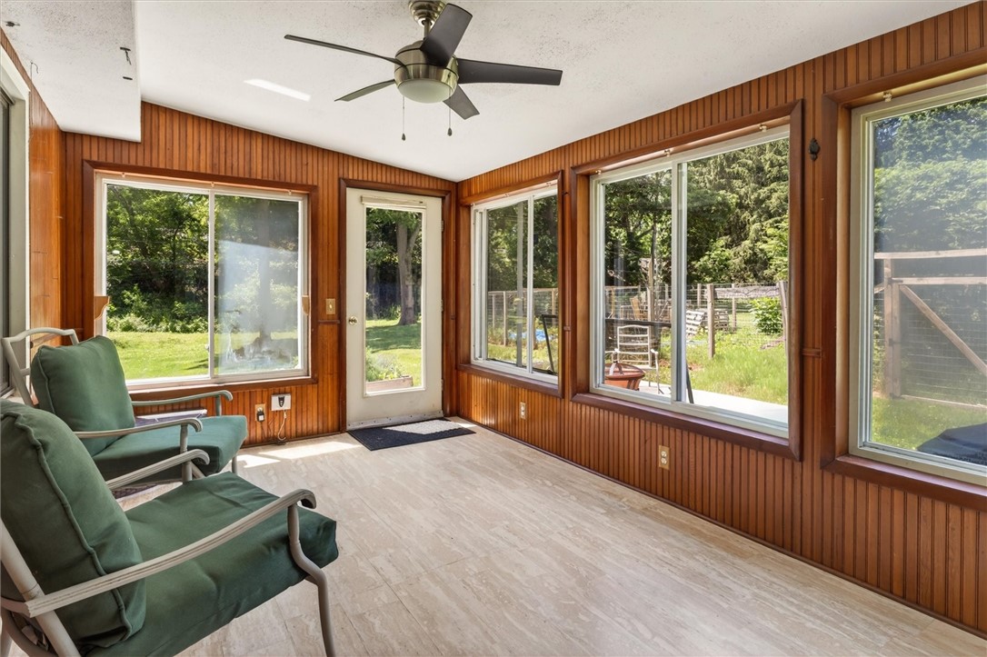 115 Crescent Road Perinton, NY 14450 - Photo 20 of 31 3-season enclosed porch features windows on all si