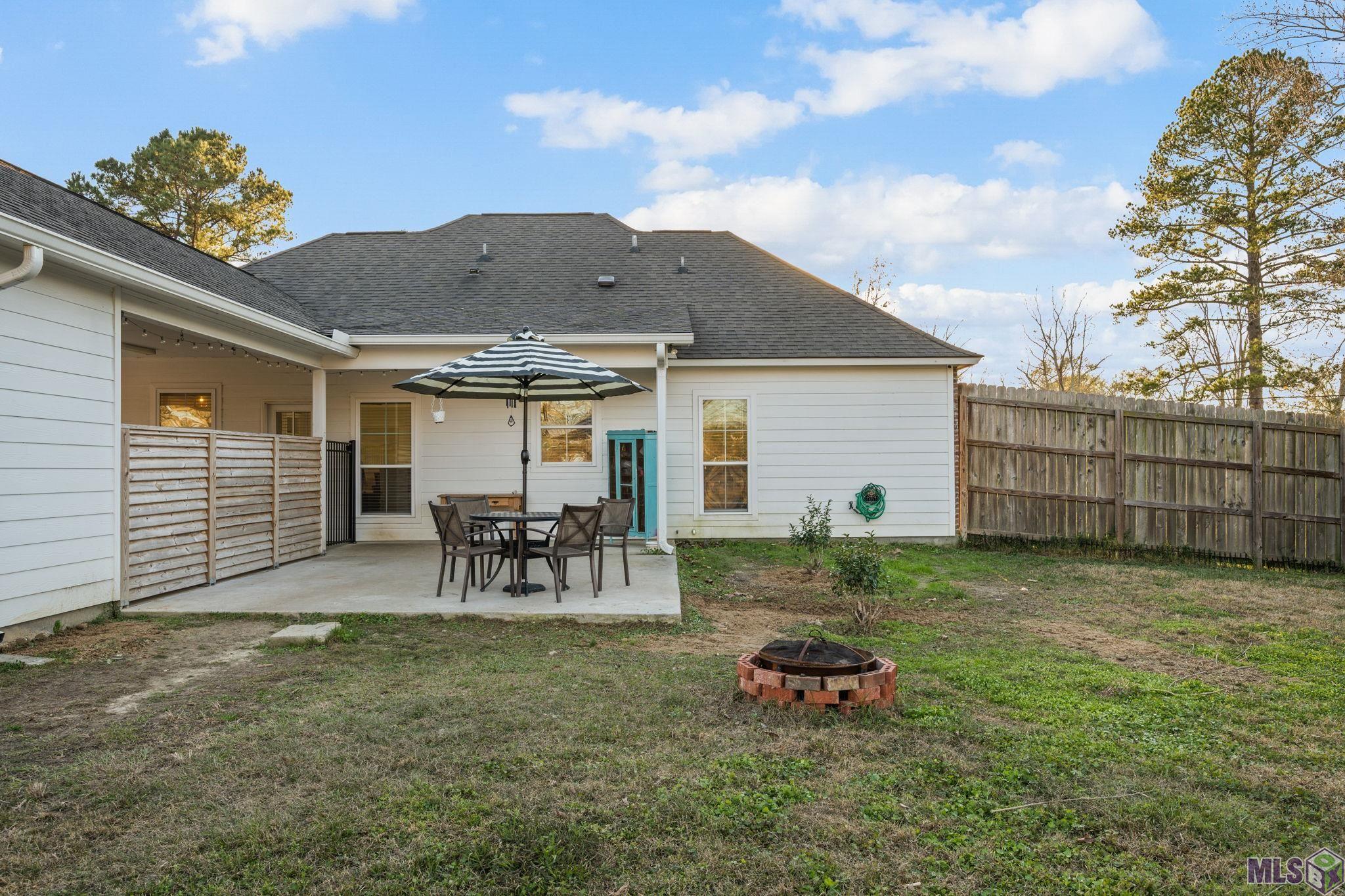 18478 Magnolia Estates Prairieville, LA 70769 - Photo 19 of 21 OPEN PATIO WITH FULLY FENCED YARD