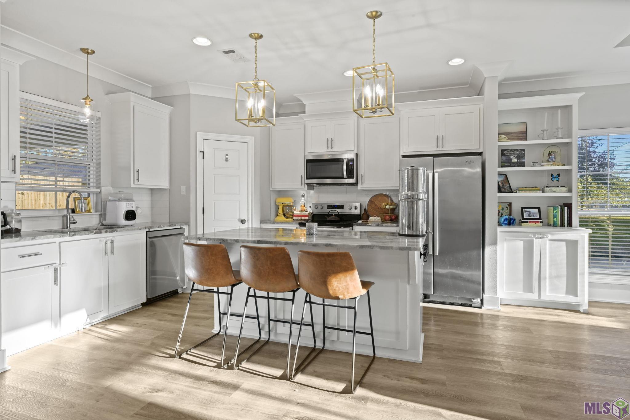 18478 Magnolia Estates Prairieville, LA 70769 - Photo 9 of 21 KITCHEN HAS STAINLESS STEEL APPLIANCES