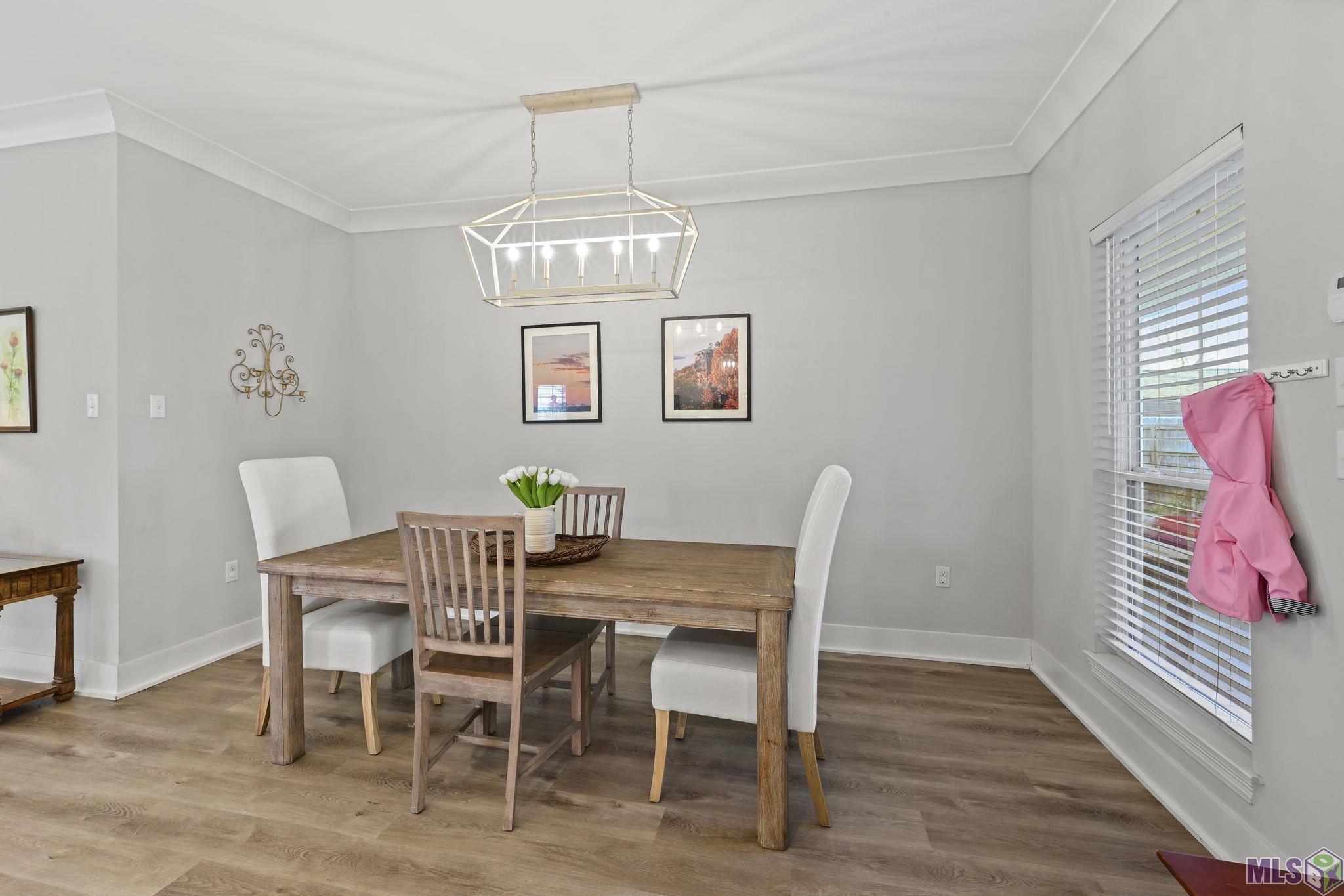 18478 Magnolia Estates Prairieville, LA 70769 - Photo 10 of 21 DINING ROOM OPEN TO KITCHEN