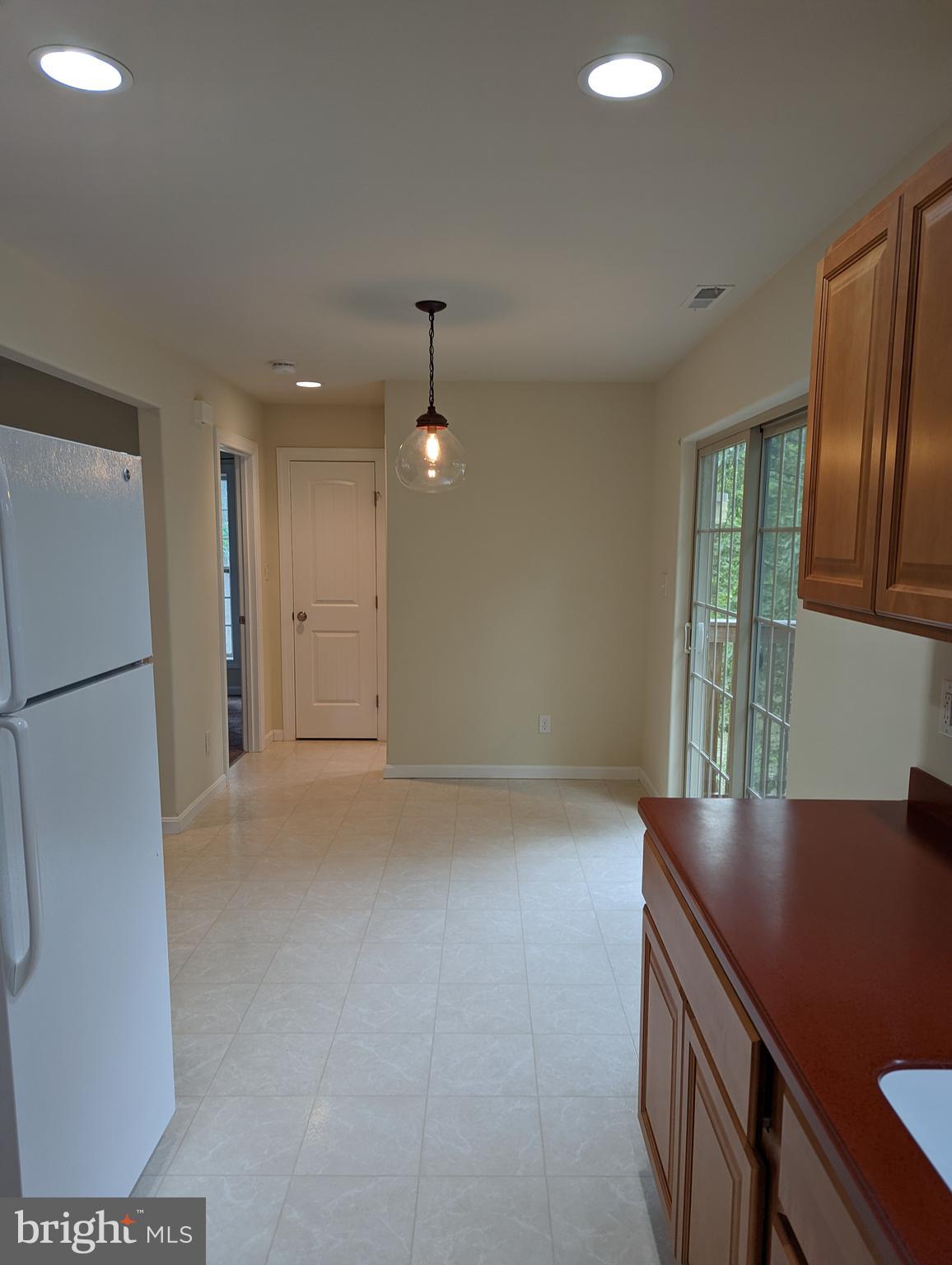 1941 Windswept Drive Dover, DE 19901 - Photo 12 of 34 a view of kitchen and front door
