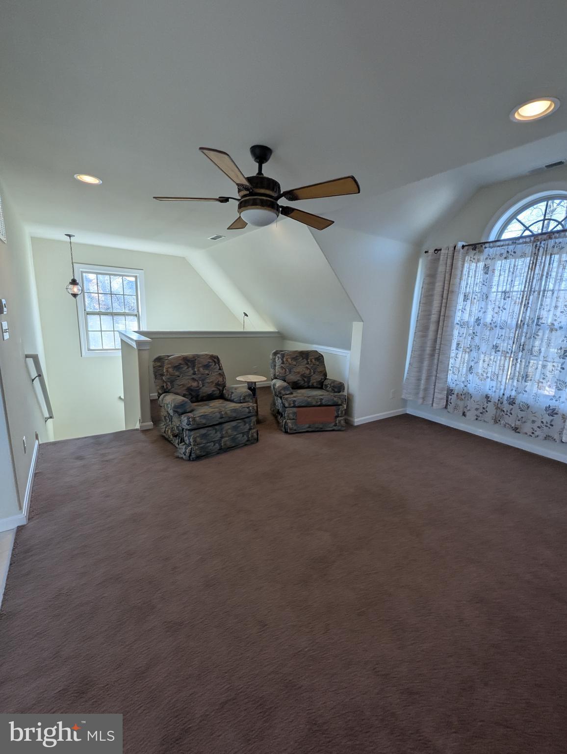 1941 Windswept Drive Dover, DE 19901 - Photo 20 of 34 a living room with furniture and a flat screen tv
