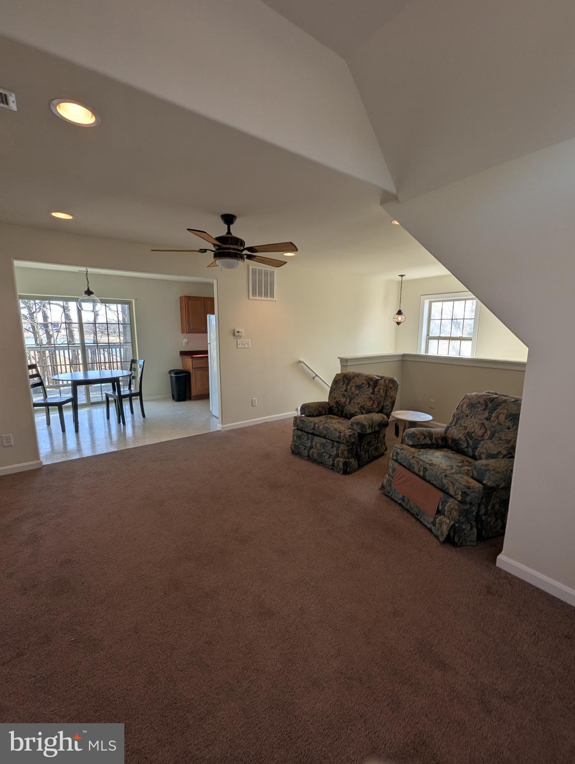 1941 Windswept Drive Dover, DE 19901 - Photo 21 of 34 a living room with furniture and a ceiling fan