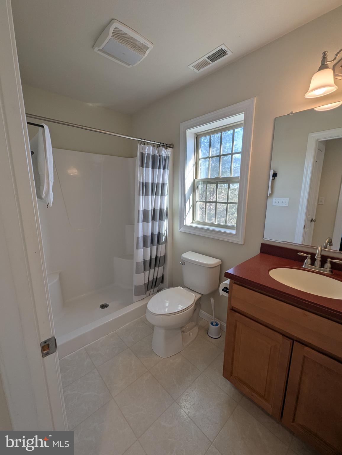 1941 Windswept Drive Dover, DE 19901 - Photo 25 of 34 a bathroom with a sink toilet and shower