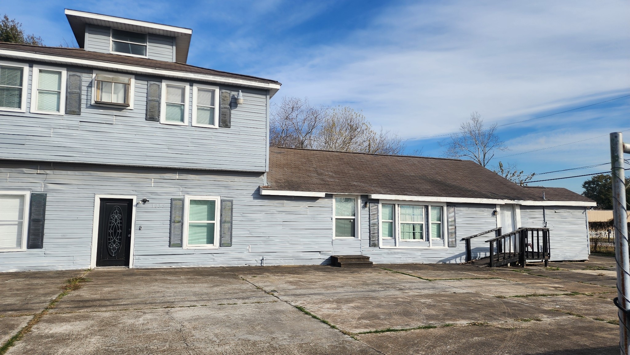 a front view of a house with a patio