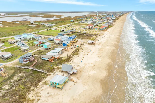 a view of an ocean and a mountain