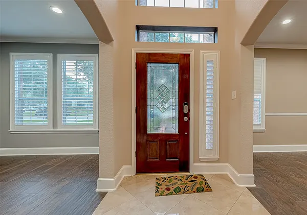 a view of entryway with wooden floor