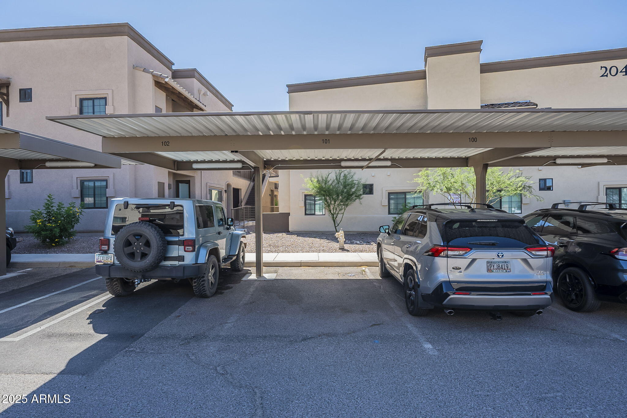 2038 East River Road, Unit 101 Tucson, AZ 85718 - Photo 20 of 21 a view of parking garage