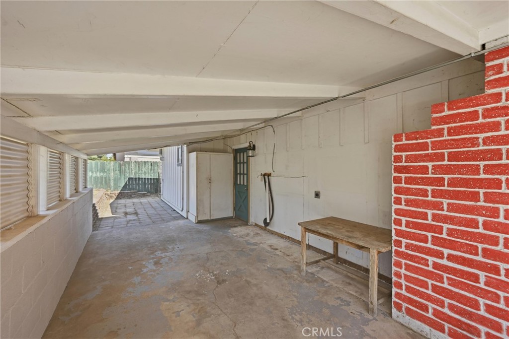 13701 Arrowhead Road Clearlake, CA 95422 - Photo 13 of 21 Far side of the carport has pavers for another patio space.