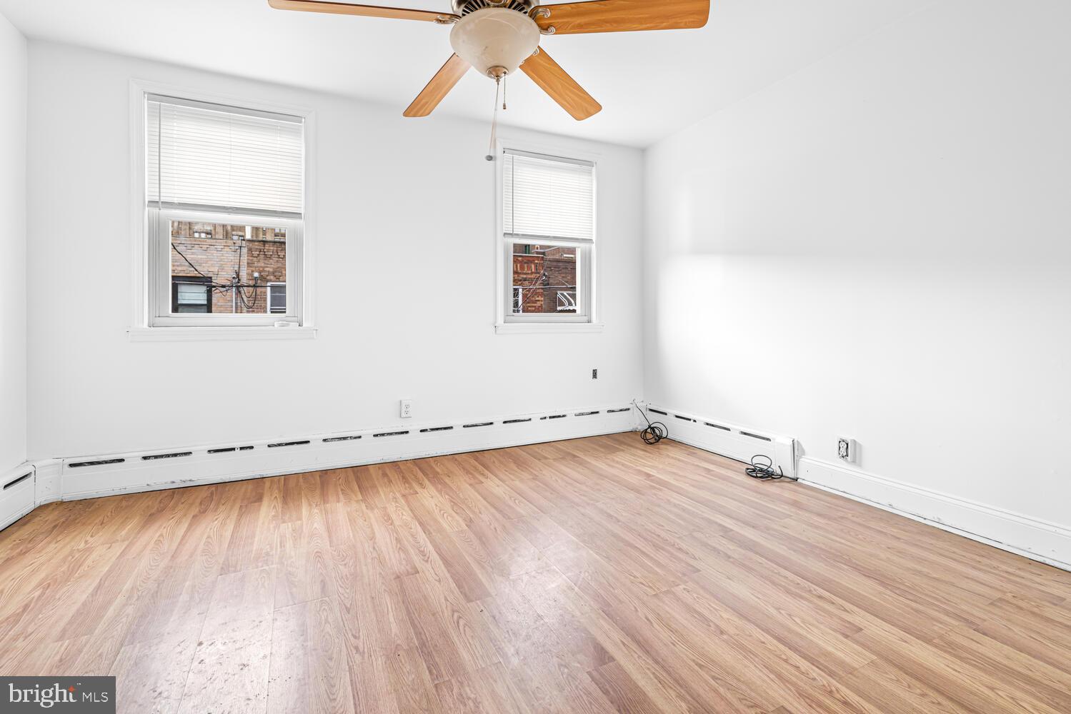 809 McClellan Street Philadelphia, PA 19148 - Photo 21 of 25 Bright and airy Master Bedroom with wooden floors.