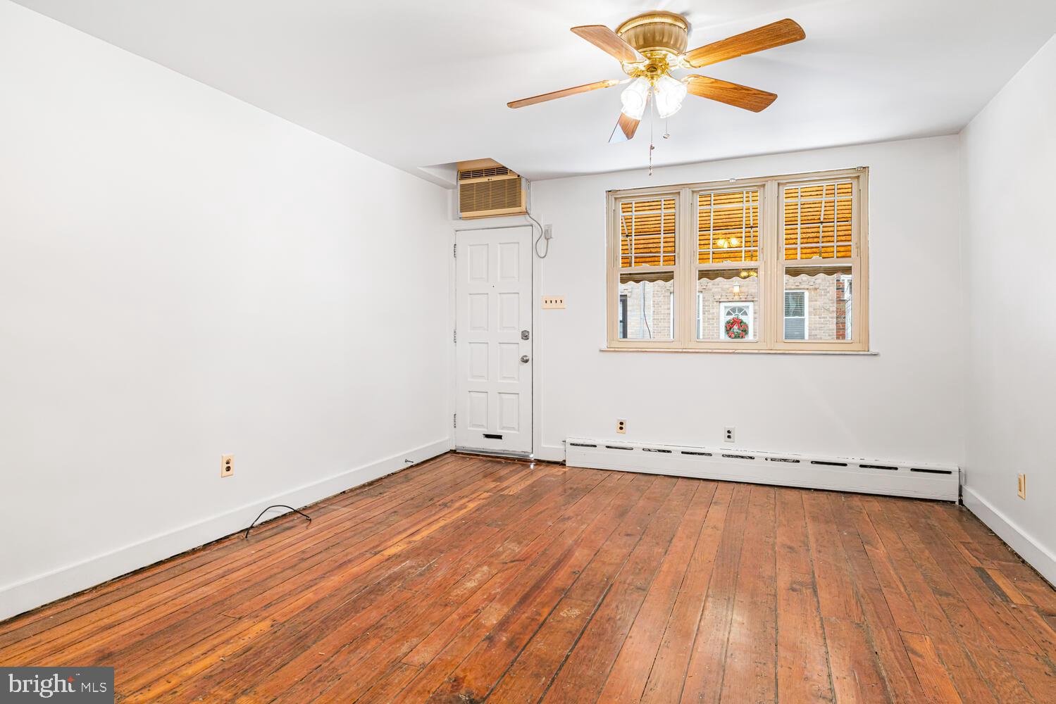 809 McClellan Street Philadelphia, PA 19148 - Photo 5 of 25 Front of living room with large front window