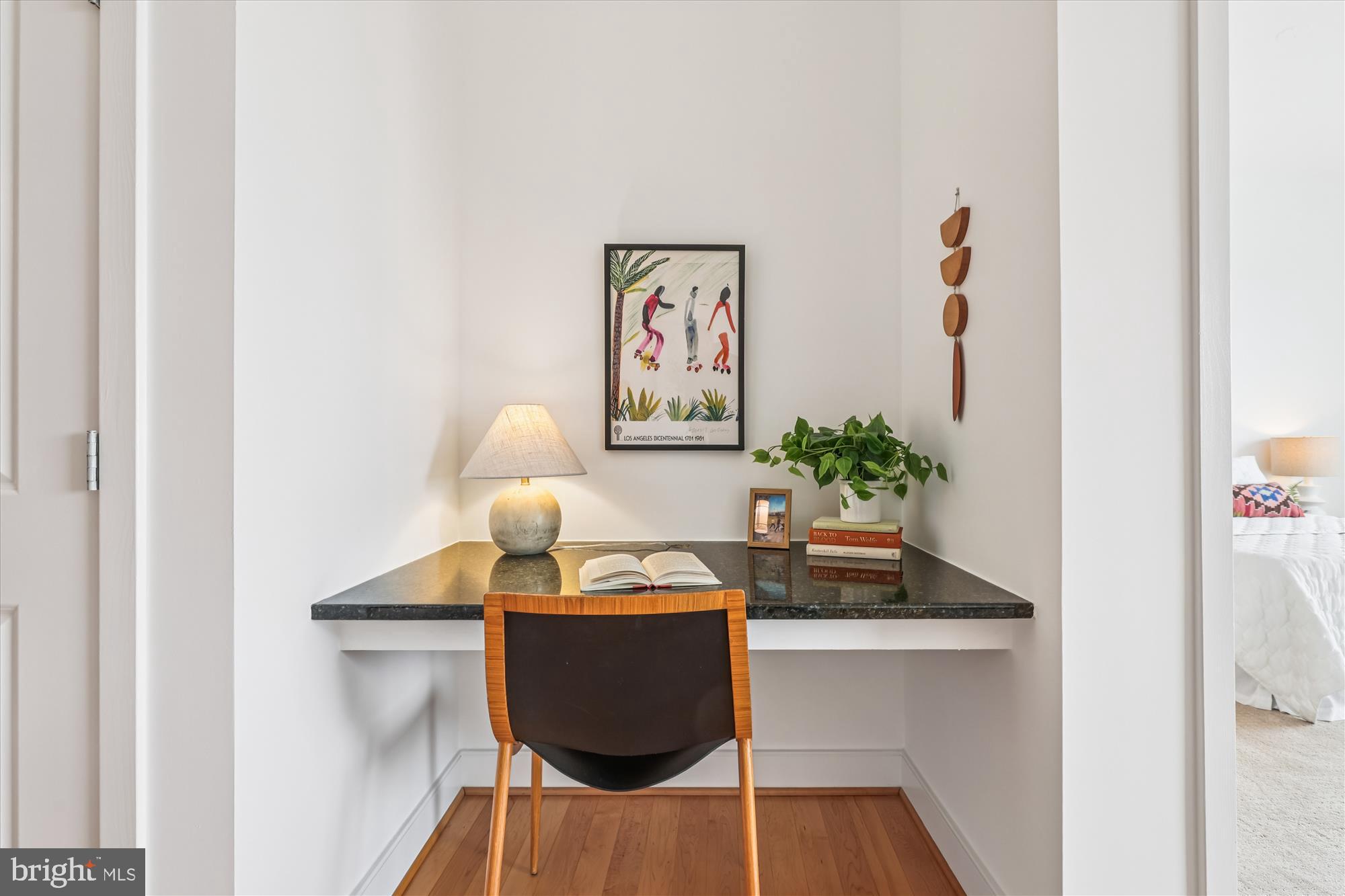 4101 Albemarle Street Northwest, Unit 623 Washington, DC 20016 - Photo 5 of 25 a view of a workspace with furniture