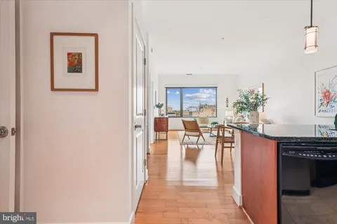 a view of a living room and dining room