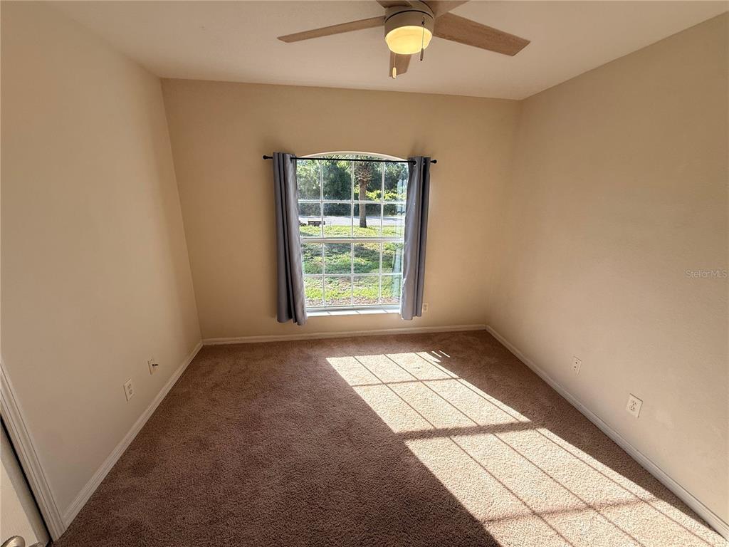 4185 Amari Road North Port, FL 34291 - Photo 12 of 14 an empty room with windows
