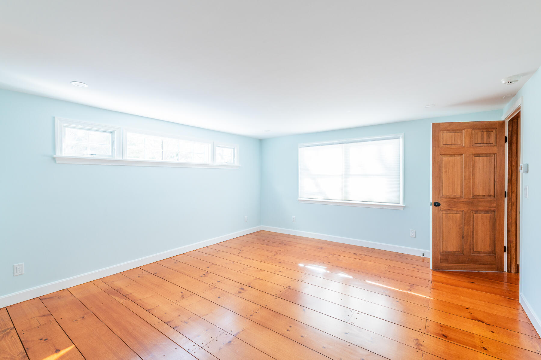16 Meltiah Road Falmouth, MA 02540 - Photo 24 of 64 a view of empty room with wooden floor and fan