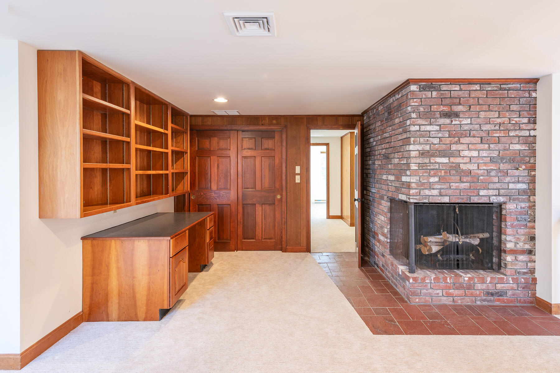 16 Meltiah Road Falmouth, MA 02540 - Photo 38 of 64 a view of an empty room with a fireplace and a window