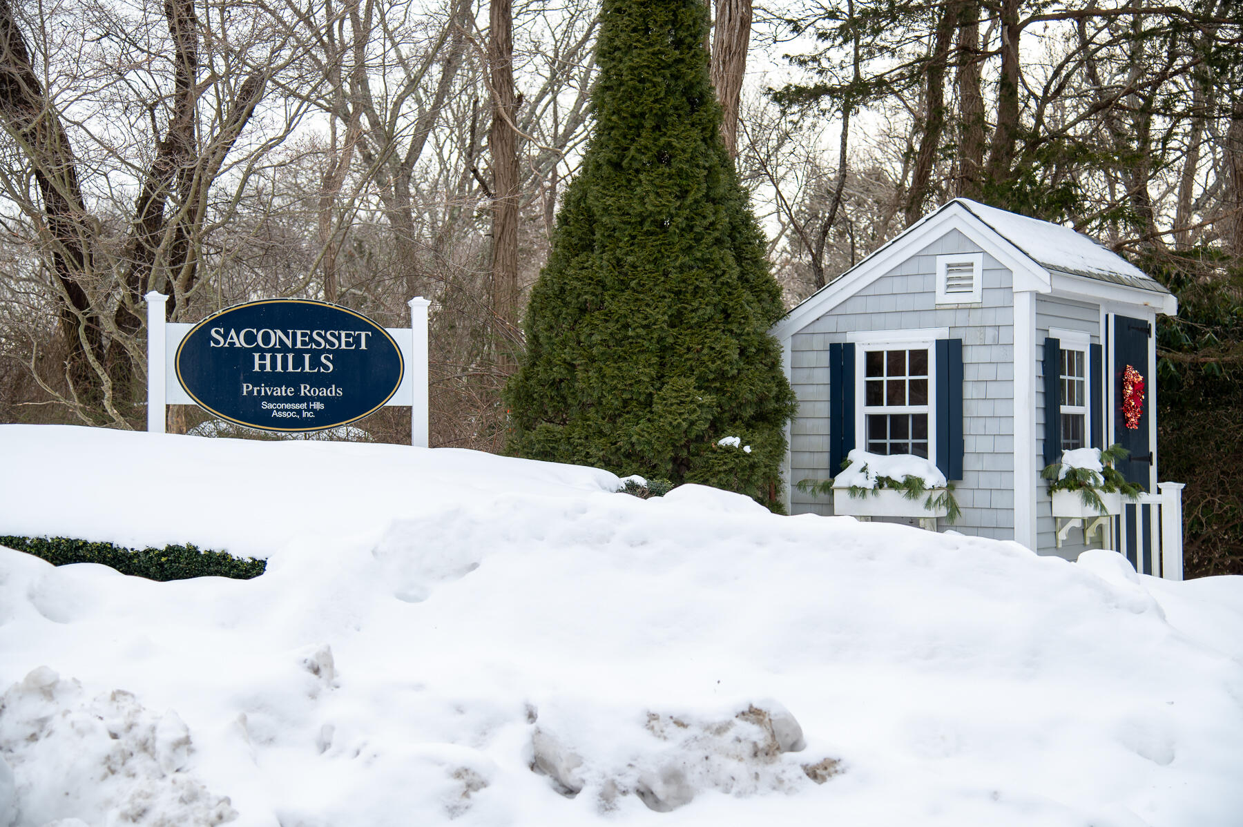 16 Meltiah Road Falmouth, MA 02540 - Photo 40 of 64 a view of a white house with a large tree in front of it