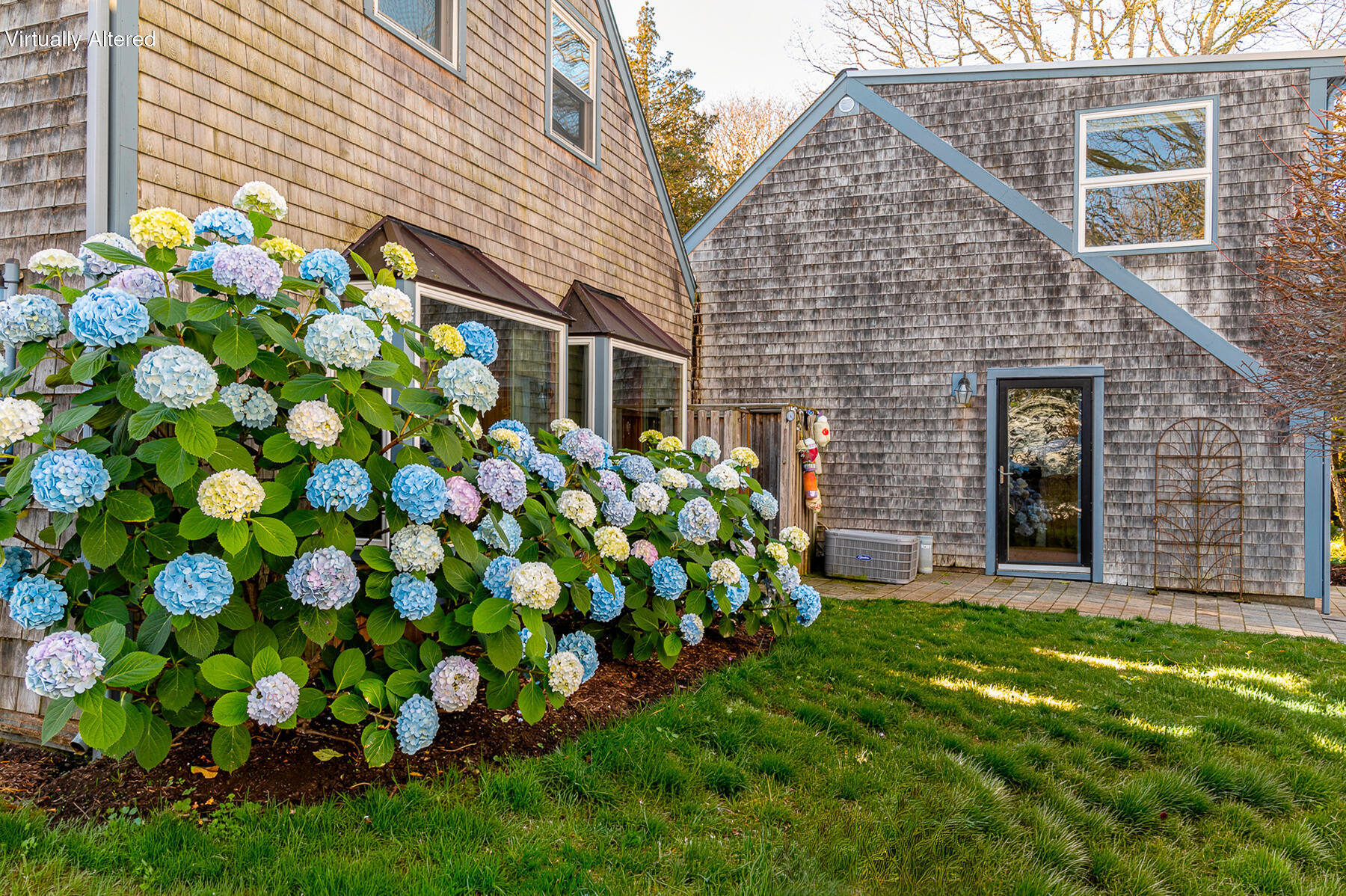 16 Meltiah Road Falmouth, MA 02540 - Photo 5 of 64 a backyard of a house with lots of green space