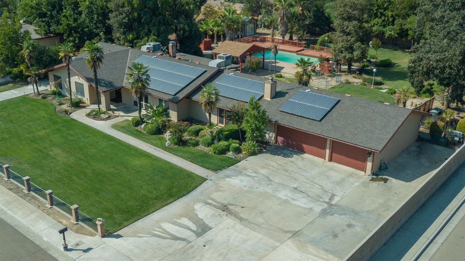 3140 North Temperance Avenue Clovis, CA 93611 - Photo 2 of 36 an aerial view of a house with garden space and street view