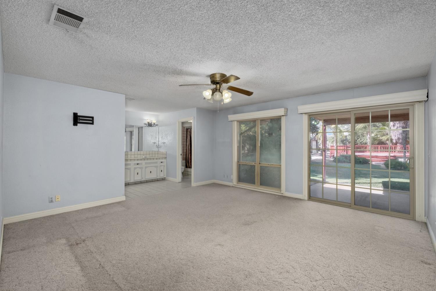 3140 North Temperance Avenue Clovis, CA 93611 - Photo 23 of 36 a view of an empty room with a window