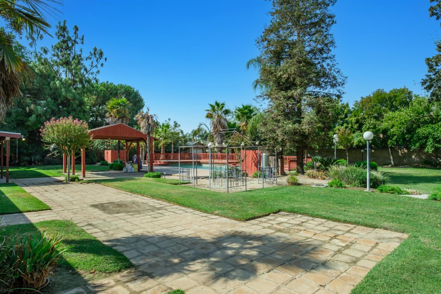 3140 North Temperance Avenue Clovis, CA 93611 - Photo 33 of 36 a view of a park with plants and trees