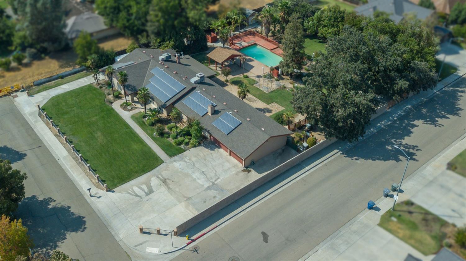 3140 North Temperance Avenue Clovis, CA 93611 - Photo 6 of 36 an aerial view of residential houses with outdoor space