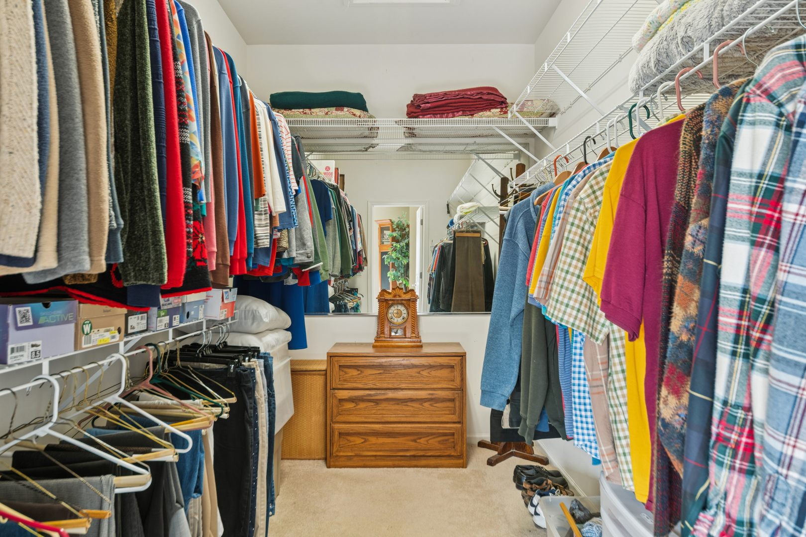 2545 Edgewater Drive Elgin, IL 60124 - Photo 13 of 21 a view of walk in closet with clothes and shoes
