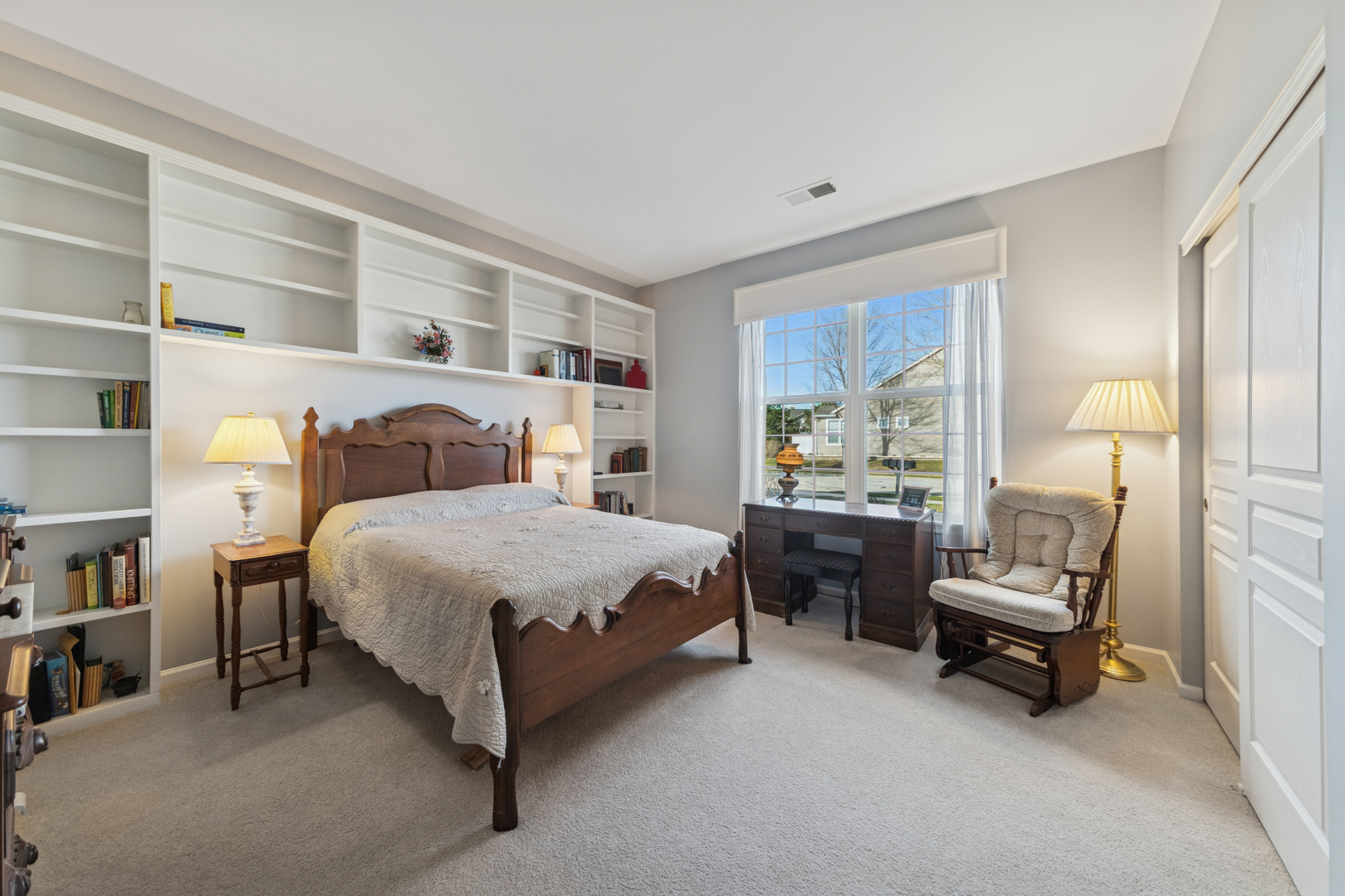 2545 Edgewater Drive Elgin, IL 60124 - Photo 15 of 21 a bedroom with a bed and a large window