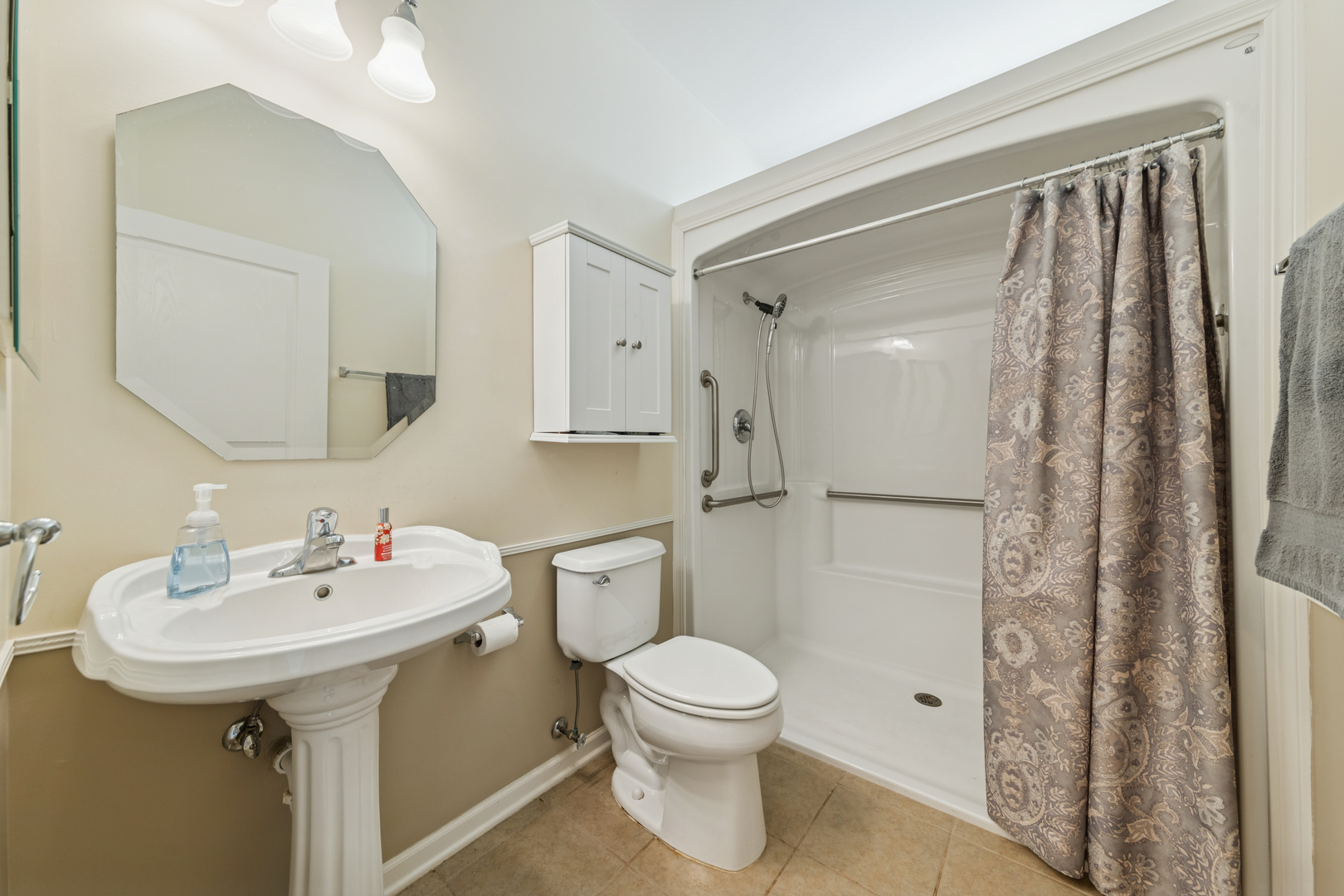 2545 Edgewater Drive Elgin, IL 60124 - Photo 16 of 21 a bathroom with a sink toilet and shower