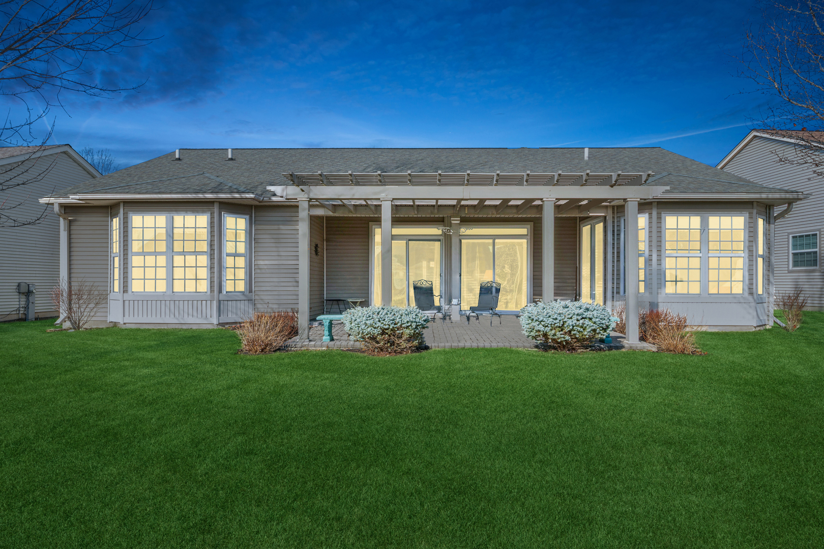 2545 Edgewater Drive Elgin, IL 60124 - Photo 2 of 21 a front view of a house with a garden