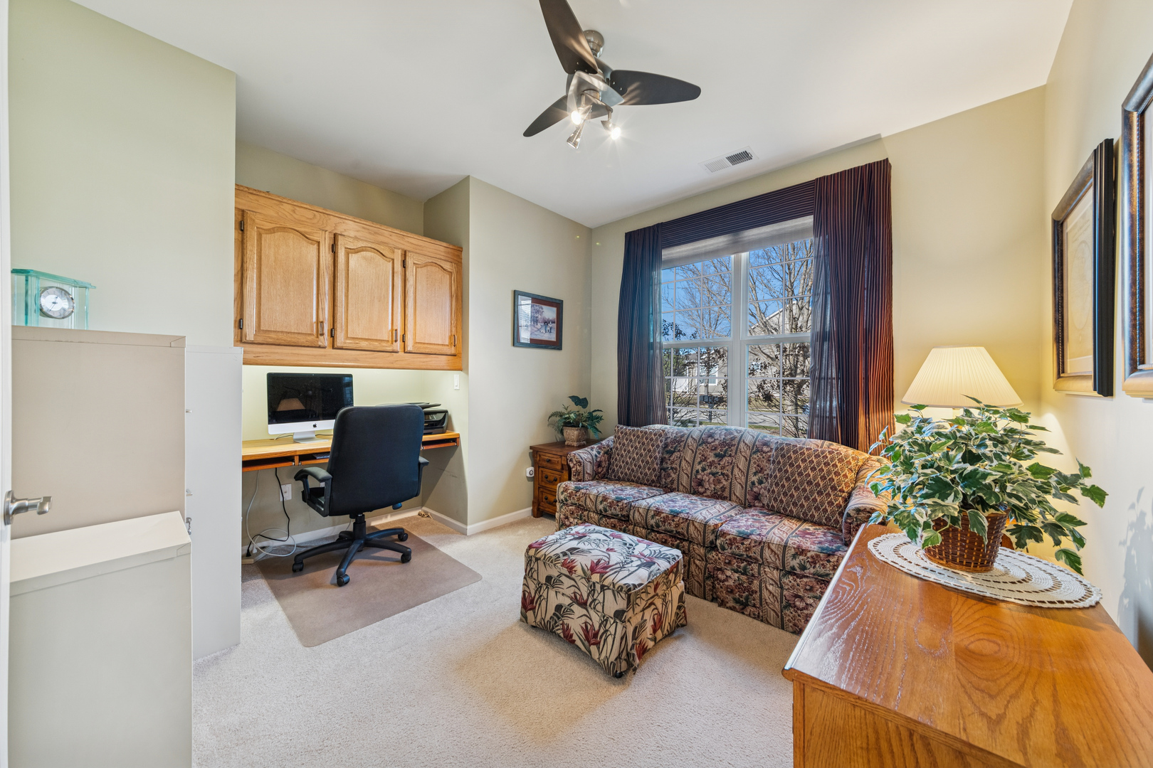 2545 Edgewater Drive Elgin, IL 60124 - Photo 6 of 21 a living room with furniture and a flat screen tv
