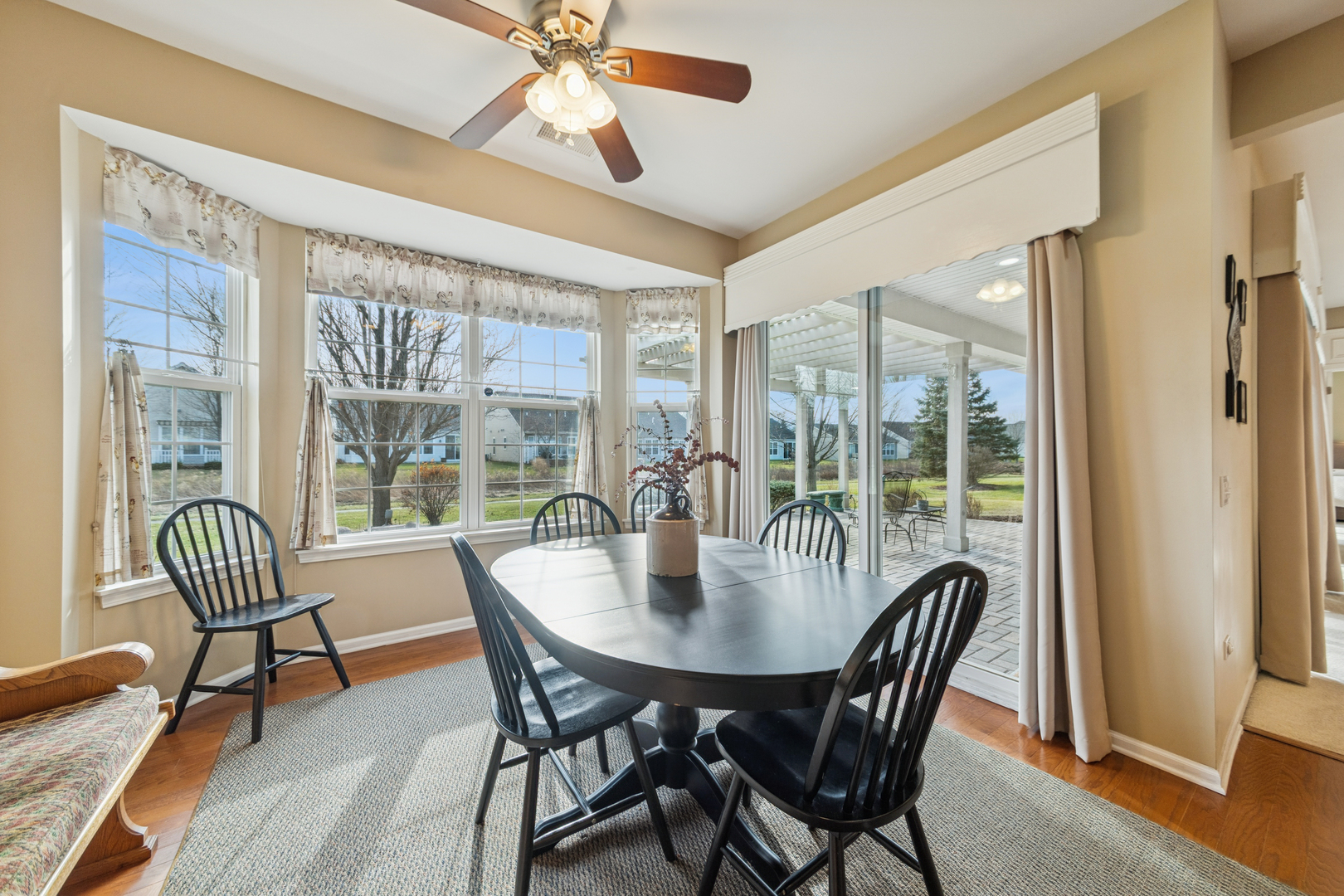2545 Edgewater Drive Elgin, IL 60124 - Photo 9 of 21 a view of a dining room with furniture window and wooden floor