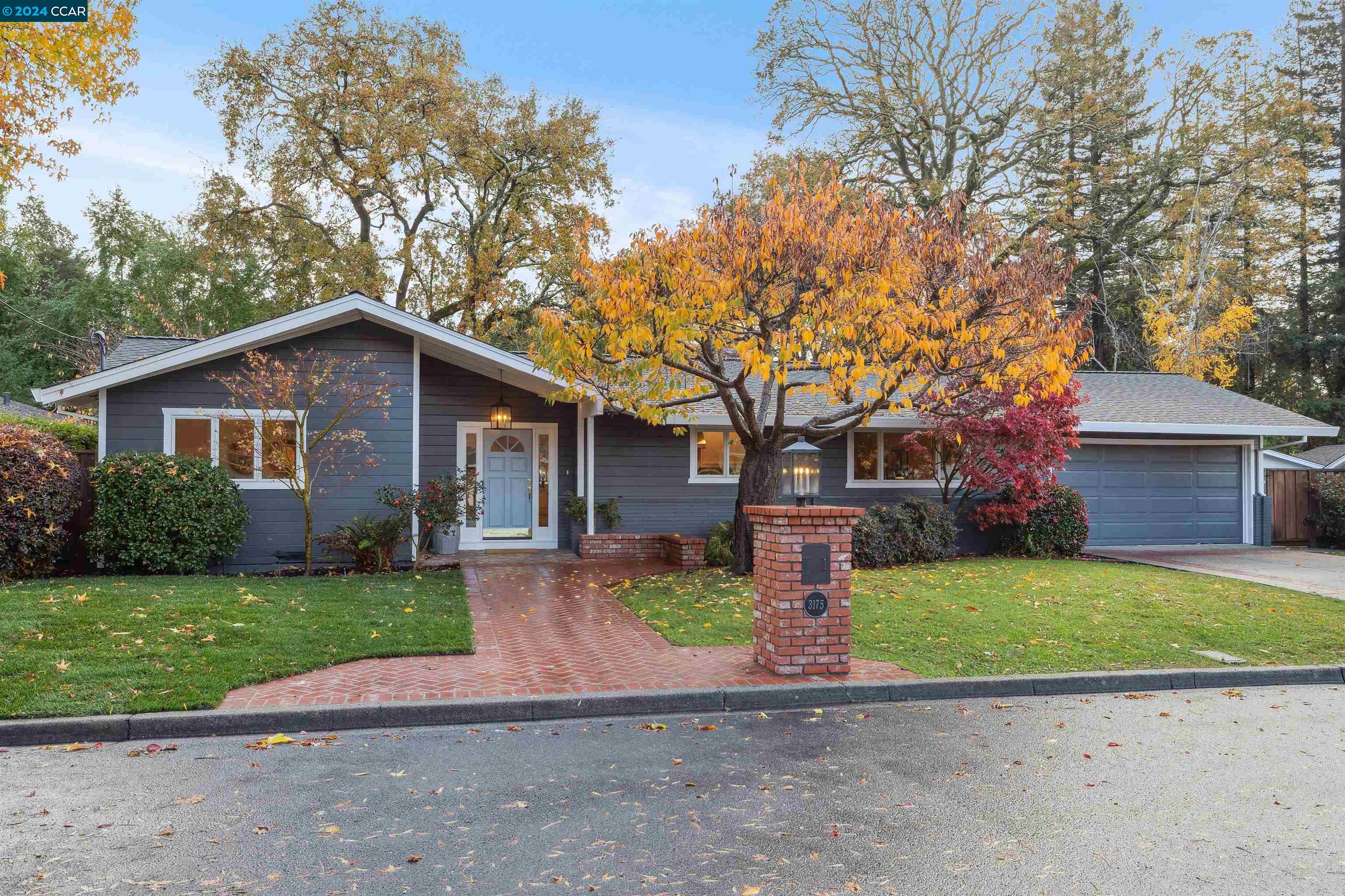 3175 Somerset Drive Lafayette, CA 94549 - Photo 1 of 1 a front view of a house with a yard and garage