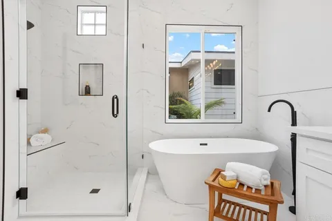 a bathroom with a sink and a shower