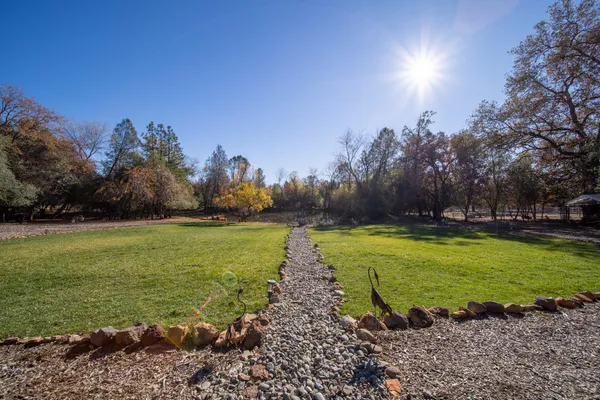 a view of backyard with green space