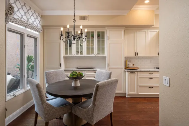 a view of a dining room with furniture and window