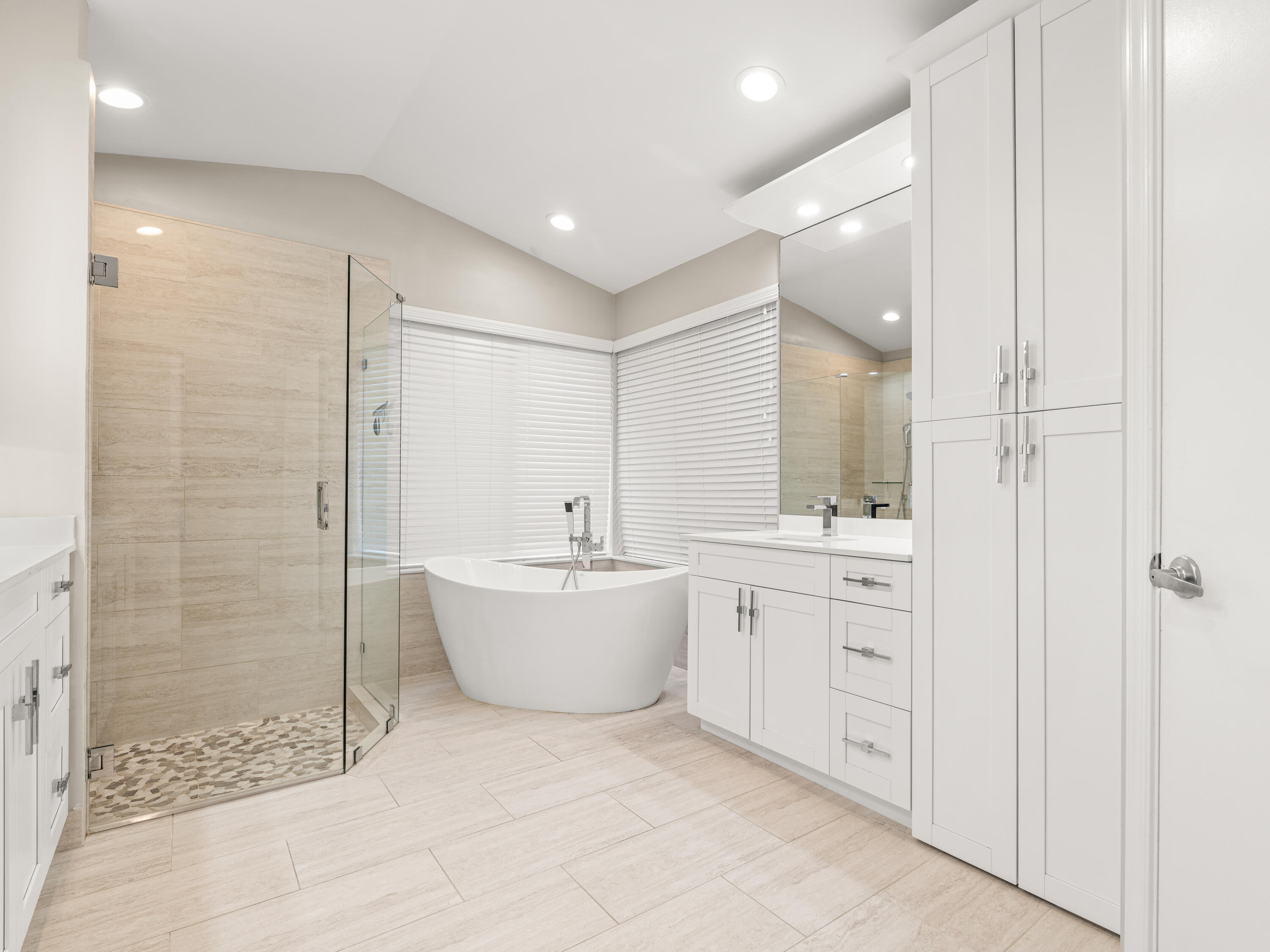 833 Heron Road Weston, FL 33326 - Photo 17 of 34 a bathroom with a bathtub shower sink and toilet