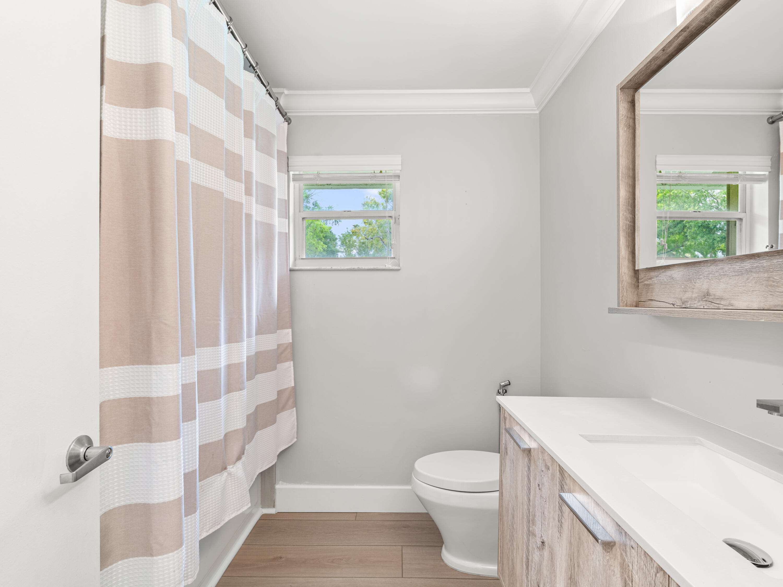833 Heron Road Weston, FL 33326 - Photo 21 of 34 a bathroom with a sink toilet and shower