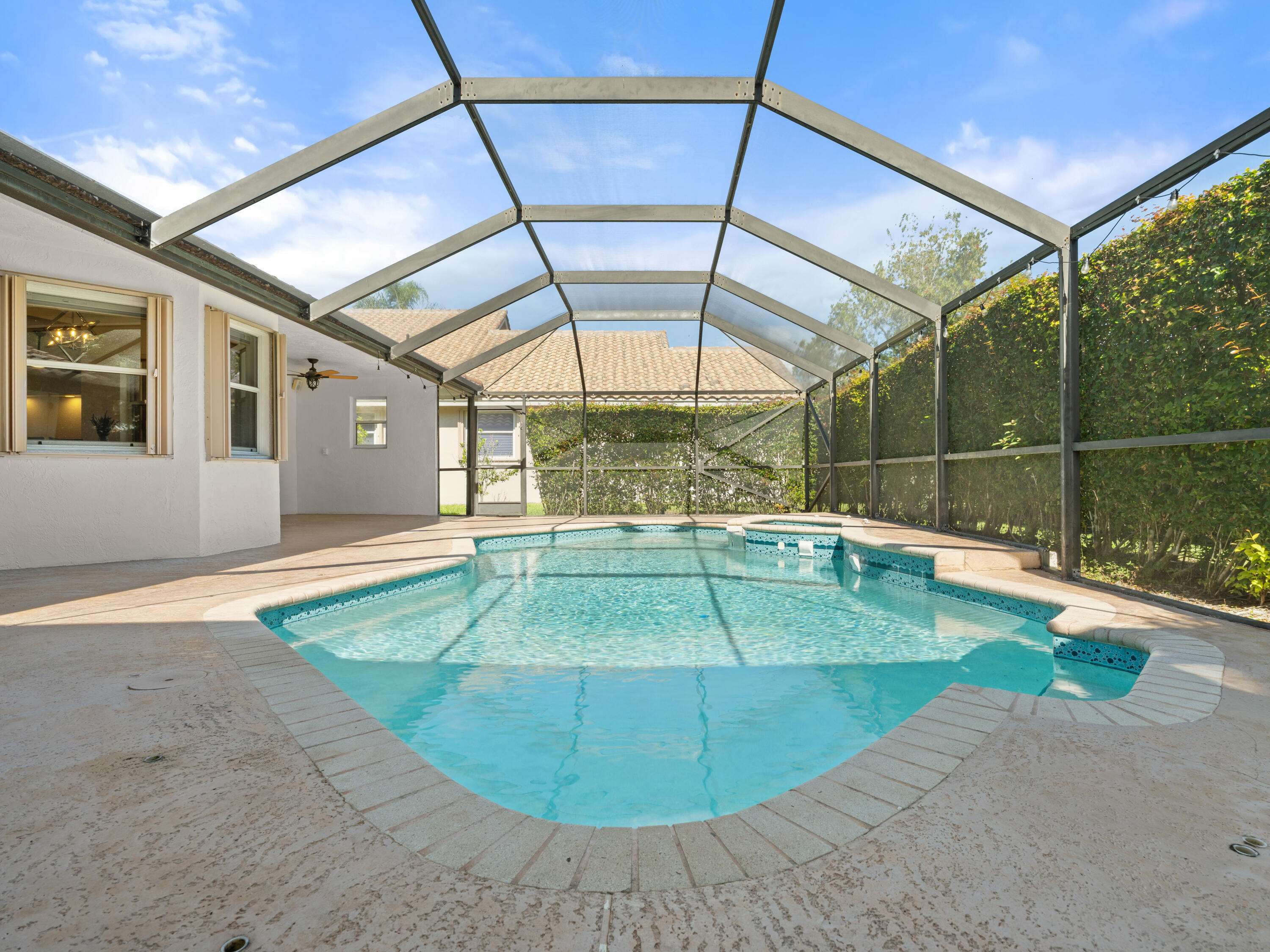 833 Heron Road Weston, FL 33326 - Photo 25 of 34 an outdoor space with swimming pool