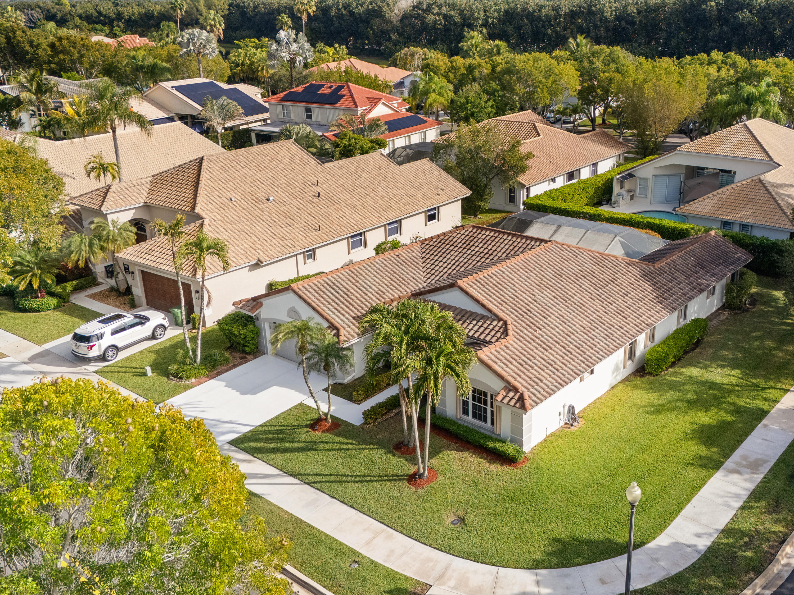 833 Heron Road Weston, FL 33326 - Photo 27 of 34 an aerial view of a house with a garden and swimming pool