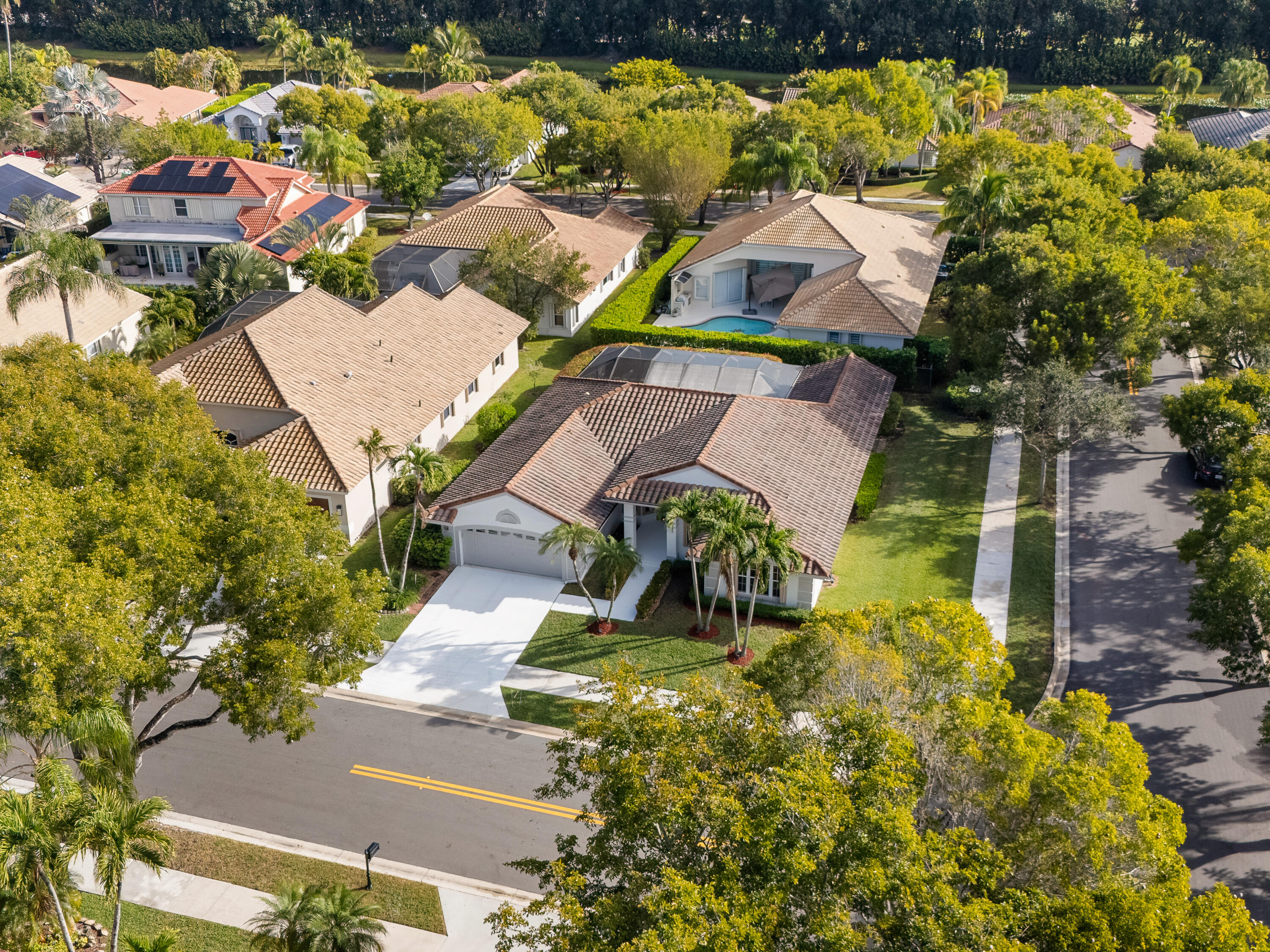 833 Heron Road Weston, FL 33326 - Photo 30 of 34 an aerial view of residential houses with outdoor space