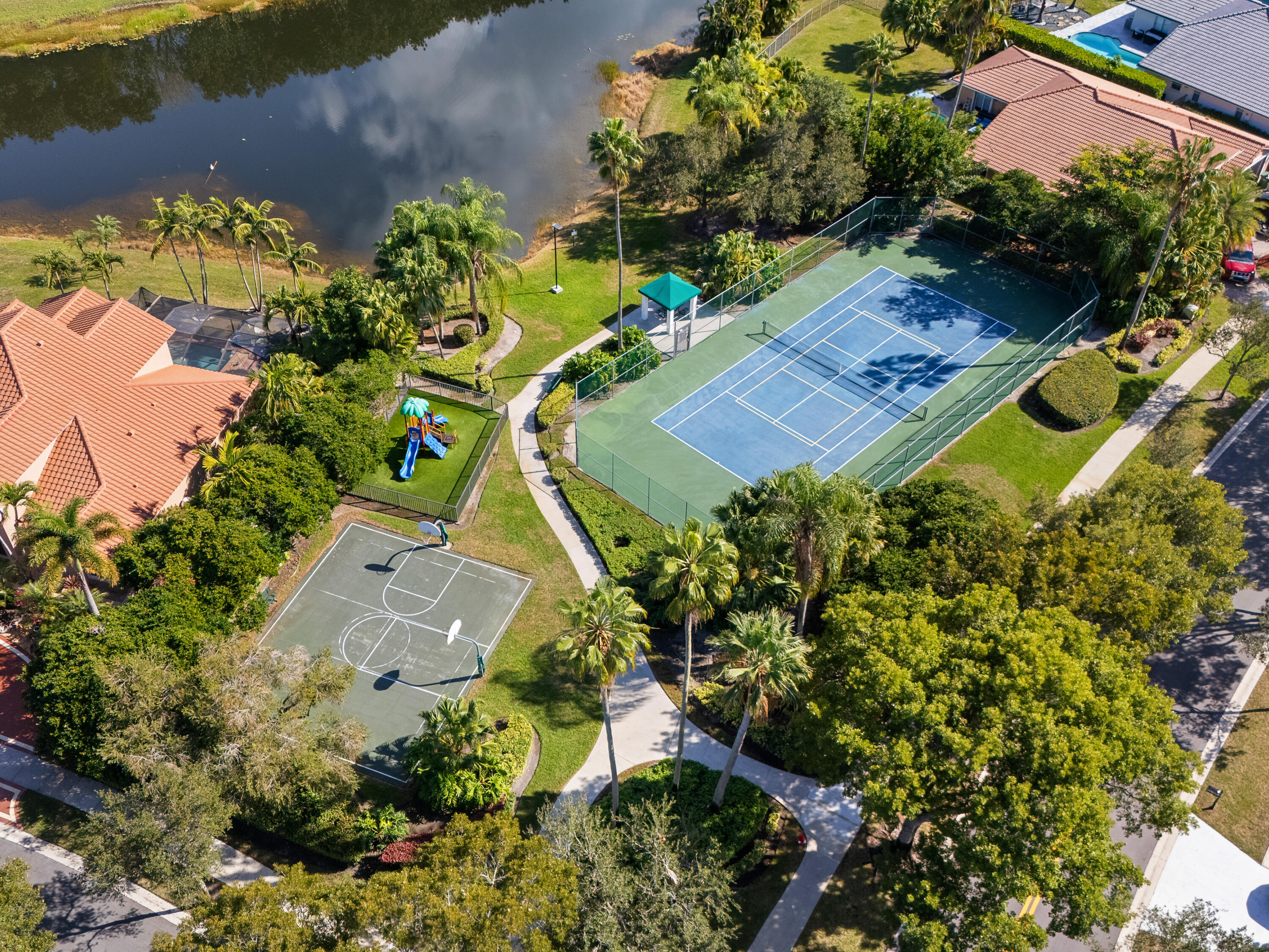 833 Heron Road Weston, FL 33326 - Photo 32 of 34 an aerial view of a house with a yard
