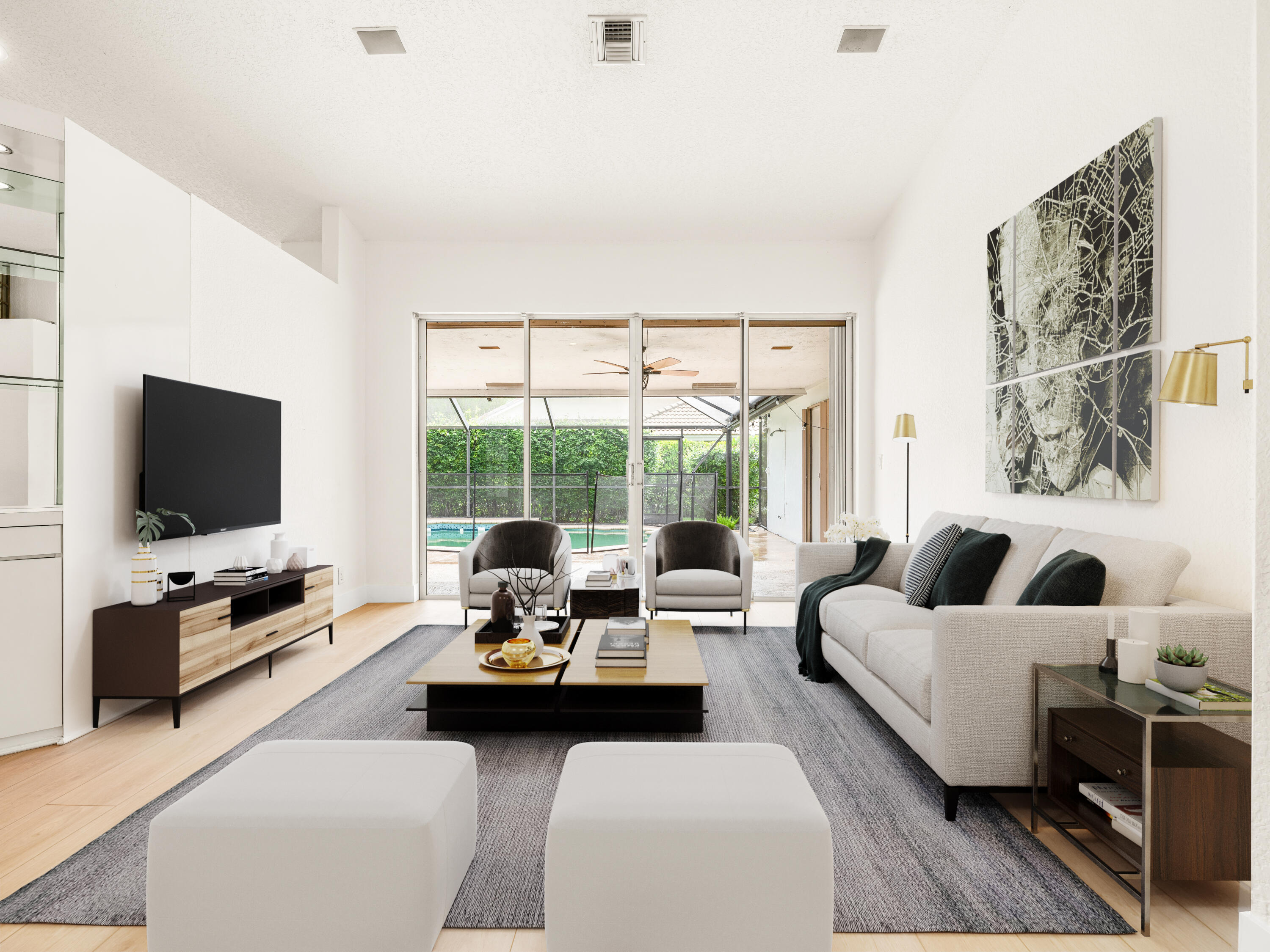 833 Heron Road Weston, FL 33326 - Photo 5 of 34 a living room with furniture and a flat screen tv