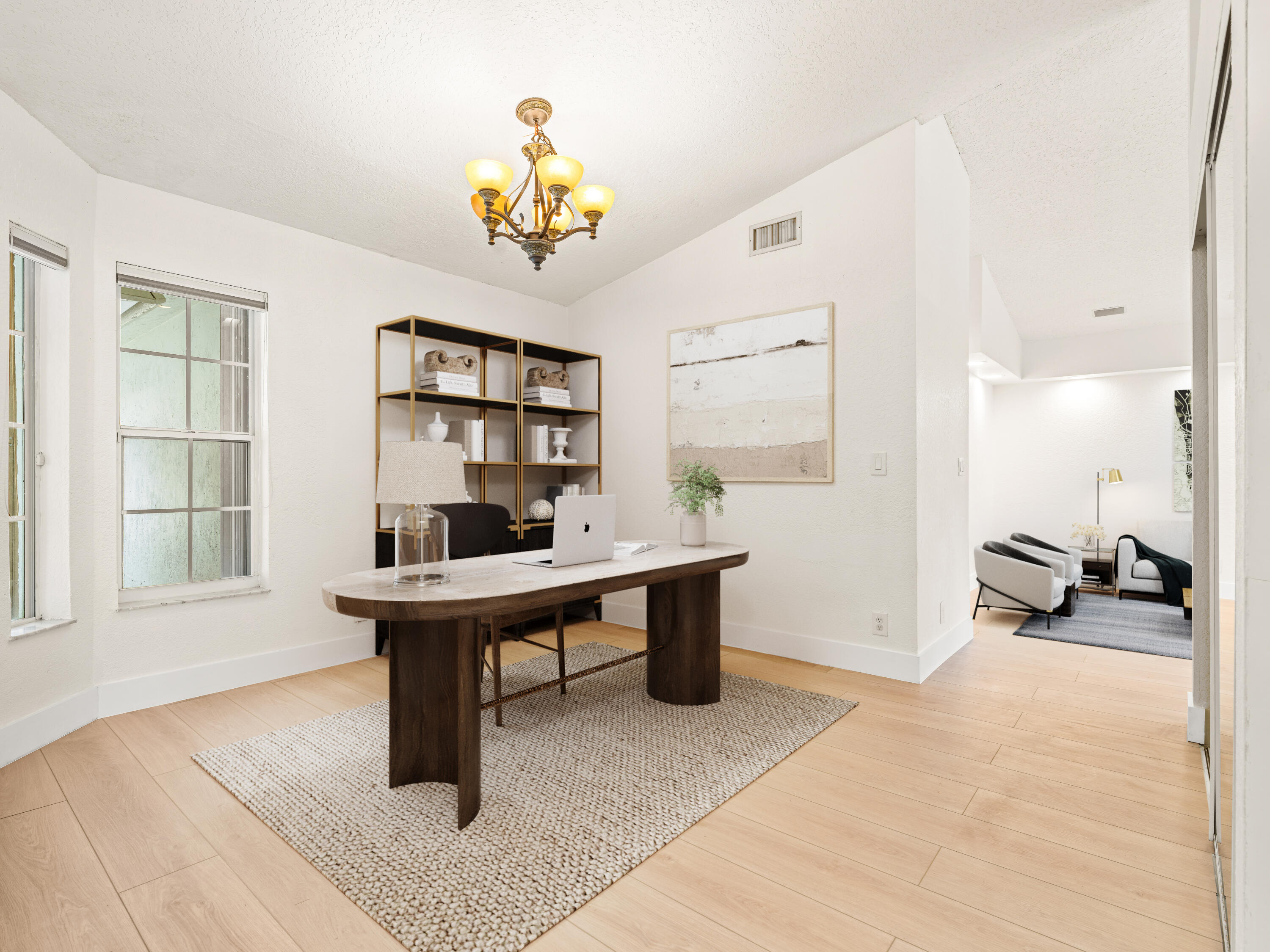 833 Heron Road Weston, FL 33326 - Photo 6 of 34 a view of a workspace with furniture and a window