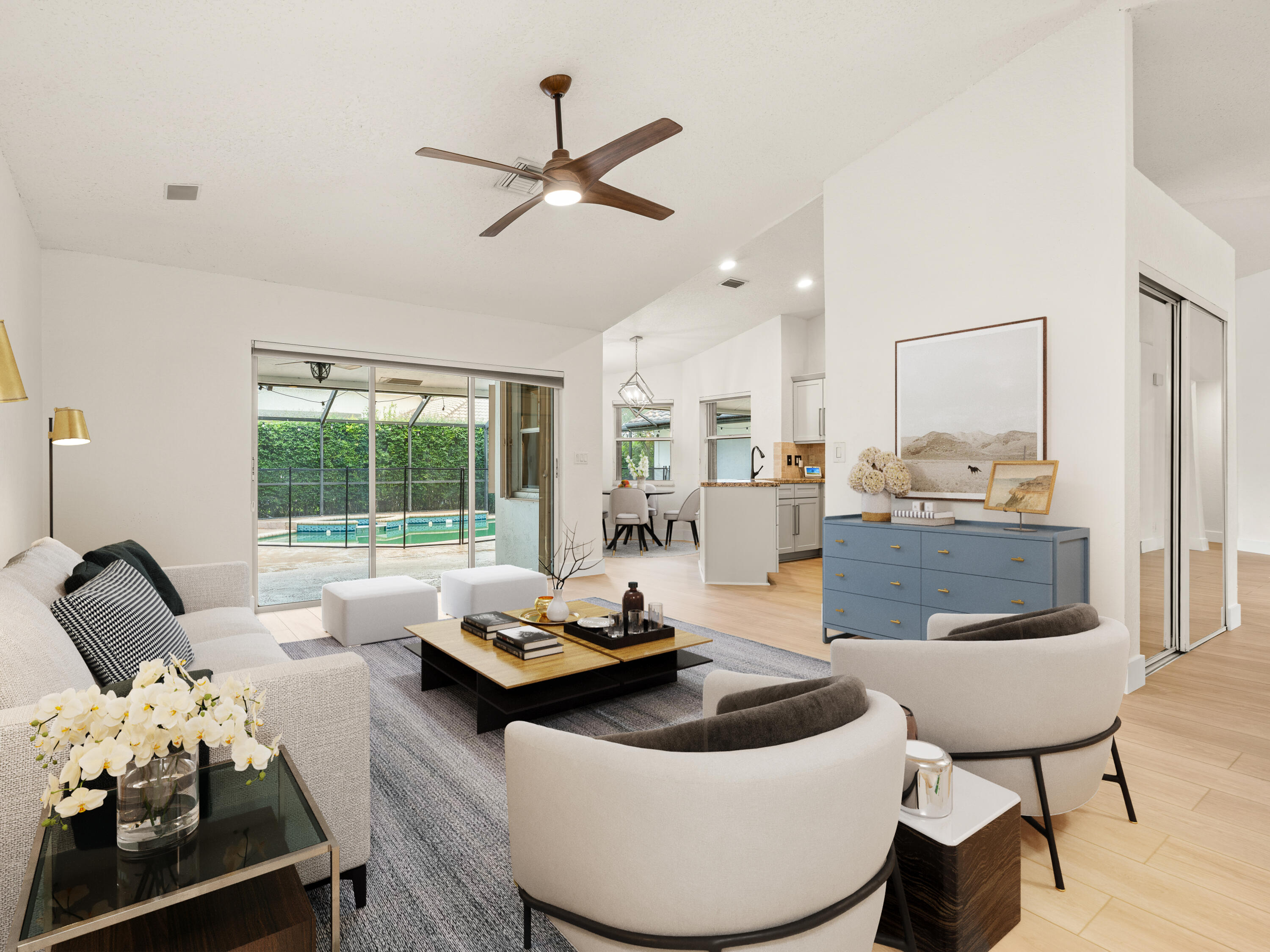 833 Heron Road Weston, FL 33326 - Photo 8 of 34 a living room with furniture and a large window