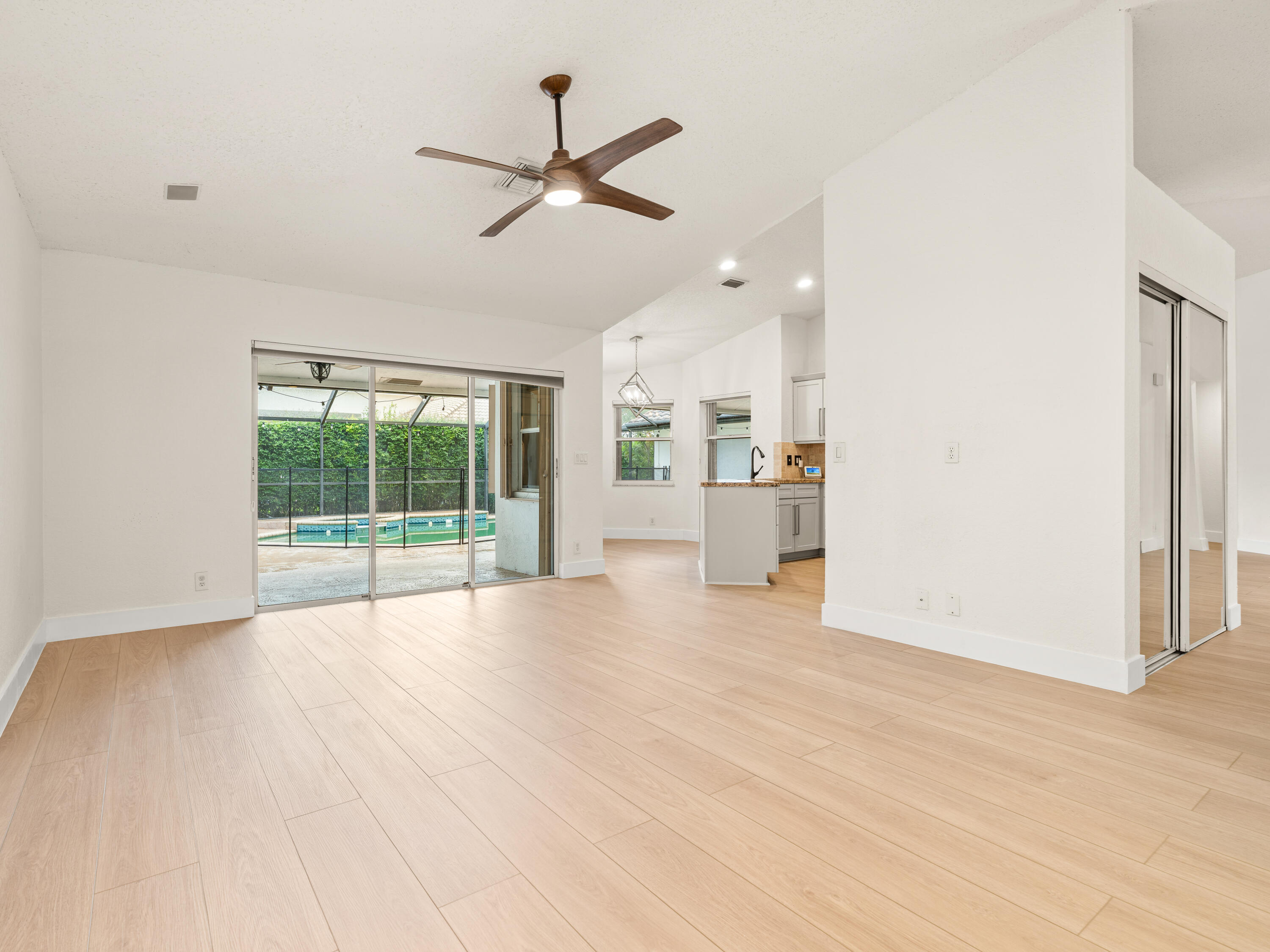 833 Heron Road Weston, FL 33326 - Photo 9 of 34 a view of an empty room with a window