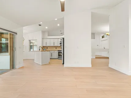 a view of kitchen with wooden floor