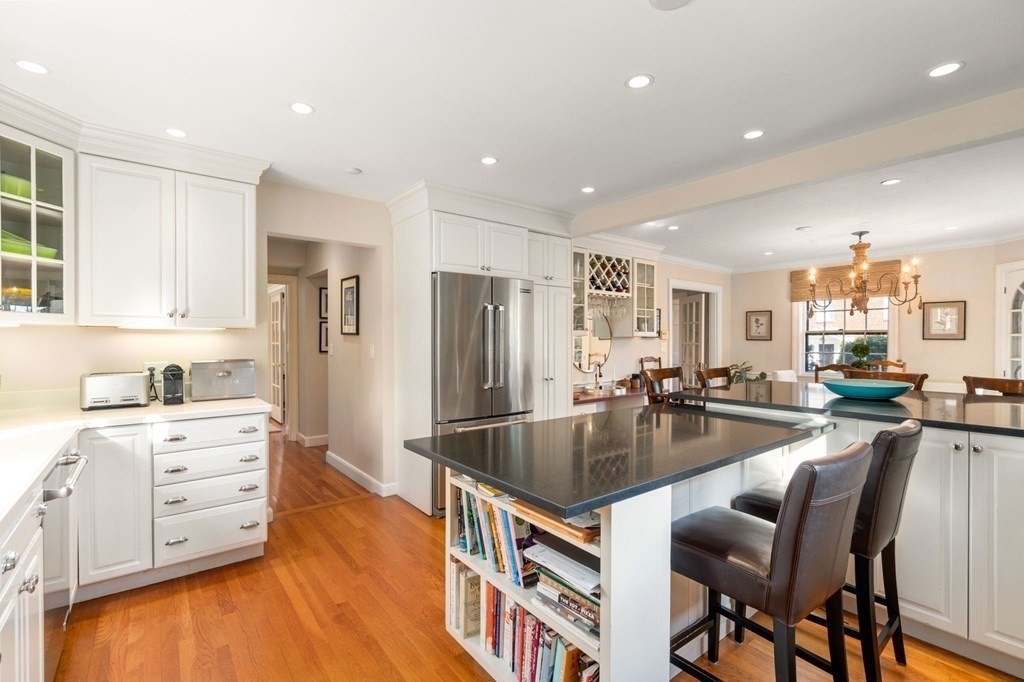 14 Hillcroft Road Boston, MA 02130 - Photo 13 of 34 a kitchen with stainless steel appliances granite countertop a sink stove and refrigerator